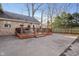 Backyard area featuring a wood deck and an umbrella at 7910 Teel Way, Indianapolis, IN 46256