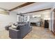 Inviting living room boasting tile floors, wooden beams, and a cozy seating arrangement at 7910 Teel Way, Indianapolis, IN 46256