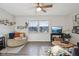 Cozy living room with hardwood floors and a large window, offering ample natural light at 7910 Teel Way, Indianapolis, IN 46256