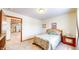 Bedroom with a bed and window and an open doorway at 7937 Bentley Commons Dr, Indianapolis, IN 46259