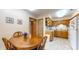 Charming kitchen with tile floor, dining area and updated appliances at 7937 Bentley Commons Dr, Indianapolis, IN 46259