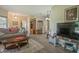 Spacious living room with hardwood floors, a comfortable couch, and a view of other rooms at 8133 Hazen Way, Indianapolis, IN 46216