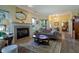 Inviting living room with fireplace, neutral color palette, and hardwood floors at 8133 Hazen Way, Indianapolis, IN 46216