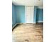 Nicely Painted Bedroom featuring modern Vinyl floors at 834 N Temple Ave, Indianapolis, IN 46201