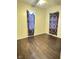 Bedroom with curtains and wood flooring at 834 N Temple Ave, Indianapolis, IN 46201