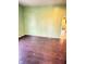 Open Living Room with Hardwood floors, ready to make new memories at 834 N Temple Ave, Indianapolis, IN 46201