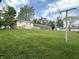Expansive backyard featuring a well-maintained lawn and shed for extra storage space at 8417 S Sherman Dr, Indianapolis, IN 46237
