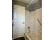 Bathroom with shower and tub with grab bar at 8417 S Sherman Dr, Indianapolis, IN 46237