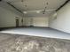 Garage features an updated paint job, creating a clean and organized space at 8417 S Sherman Dr, Indianapolis, IN 46237