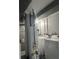 Laundry room featuring a water heater, washer, and dryer at 8417 S Sherman Dr, Indianapolis, IN 46237