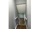 A view from the top of the home's staircase with wood-look flooring at 8417 S Sherman Dr, Indianapolis, IN 46237