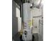 Well-maintained water heater with safety features and clear instructions for efficient operation at 8417 S Sherman Dr, Indianapolis, IN 46237