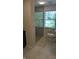 Bright bathroom featuring a glass enclosed shower and a large window at 8598 Lantern Farms Dr, Fishers, IN 46038