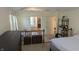 Spacious bedroom featuring an en-suite bath, neutral walls, and plush carpeting at 8598 Lantern Farms Dr, Fishers, IN 46038