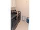Laundry room featuring front loading washer and dryer and overhead cabinets at 8598 Lantern Farms Dr, Fishers, IN 46038