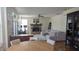 Open-concept living area with a fireplace, stylish furniture, and plenty of natural light at 8598 Lantern Farms Dr, Fishers, IN 46038