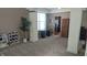 Spacious living area with a dining table, natural light, and views of the kitchen at 8598 Lantern Farms Dr, Fishers, IN 46038