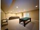 Spacious basement featuring a pool table, neutral walls, carpet, recessed lighting and an entertainment area at 8644 N Deer Crossing Blvd, McCordsville, IN 46055