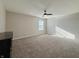 Bedroom featuring neutral carpeting, ceiling fan, and abundant natural light at 8644 N Deer Crossing Blvd, McCordsville, IN 46055