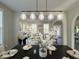 Close-up of dining table featuring white linen, gold chargers, and bright lighting at 8644 N Deer Crossing Blvd, McCordsville, IN 46055