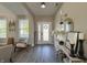 Welcoming foyer featuring modern decor, sleek flooring, and bright natural light at 8644 N Deer Crossing Blvd, McCordsville, IN 46055
