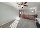 Second floor hallway with wood railings, and lots of natural light at 8644 N Deer Crossing Blvd, McCordsville, IN 46055