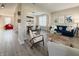 Open-concept living spaces with hardwood floors and bright decor create a welcoming and airy feel at 8644 N Deer Crossing Blvd, McCordsville, IN 46055
