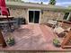 Inviting deck with dining set, grill, swing, and flower pots, ideal for outdoor entertaining at 9521 Gemini Dr, Indianapolis, IN 46229