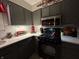 Gray kitchen with mosaic backsplash, and black stove top at 9521 Gemini Dr, Indianapolis, IN 46229