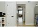 Hallway with light flooring that connects various areas of the home at 10764 Northhampton Dr, Fishers, IN 46038
