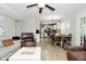 Open-concept living space connecting kitchen, dining, and living areas, ideal for modern living at 10764 Northhampton Dr, Fishers, IN 46038