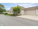 Lovely ranch home with an attached two-car garage and well-manicured front lawn at 11438 Winding Wood Dr, Indianapolis, IN 46235