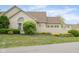 Charming brick home featuring a well-maintained yard and inviting curb appeal at 11438 Winding Wood Dr, Indianapolis, IN 46235