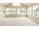 Airy sunroom with expansive windows providing abundant natural light and serene views at 11438 Winding Wood Dr, Indianapolis, IN 46235