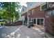 Backyard patio with hot tub and brick detailing at 11536 Woods Bay Ln, Indianapolis, IN 46236