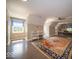 Spacious bedroom with neutral walls, wood floors, large rug, and natural light at 11536 Woods Bay Ln, Indianapolis, IN 46236