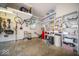 Spacious garage featuring concrete floors and overhead storage at 11536 Woods Bay Ln, Indianapolis, IN 46236