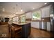 Spacious kitchen with granite counters, stainless appliances and a large island at 11536 Woods Bay Ln, Indianapolis, IN 46236