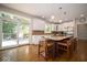 Bright kitchen boasts a center island, white cabinets, and stainless steel appliances at 11536 Woods Bay Ln, Indianapolis, IN 46236