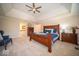 Large main bedroom with a trey ceiling and access to a spacious ensuite at 11536 Woods Bay Ln, Indianapolis, IN 46236