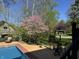 Backyard features an in-ground pool and basketball court at 11536 Woods Bay Ln, Indianapolis, IN 46236