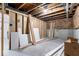 Unfinished basement with exposed framing, utilities, and concrete flooring at 12052 Northface Dr, Noblesville, IN 46060