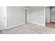 Neutral bedroom with plush carpet, white trim, and light-colored walls at 12052 Northface Dr, Noblesville, IN 46060
