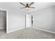 A bedroom featuring neutral walls, carpet, and a ceiling fan at 12052 Northface Dr, Noblesville, IN 46060