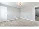 A bedroom with plush carpeting, white trim, and recessed lighting at 12052 Northface Dr, Noblesville, IN 46060