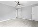 A bedroom featuring neutral walls, plush carpet, and white trim at 12052 Northface Dr, Noblesville, IN 46060