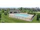 A community pool with neighborhood clubhouse, several chairs for residents and landscaped lawn area at 12052 Northface Dr, Noblesville, IN 46060