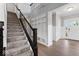 Inviting entryway with a staircase and decorative built-ins at 12052 Northface Dr, Noblesville, IN 46060