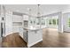 Bright open kitchen with island, stainless appliances and view to eating nook at 12052 Northface Dr, Noblesville, IN 46060