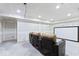 Unfinished media room featuring a large screen and tiered seating for the ultimate viewing experience at 12052 Northface Dr, Noblesville, IN 46060